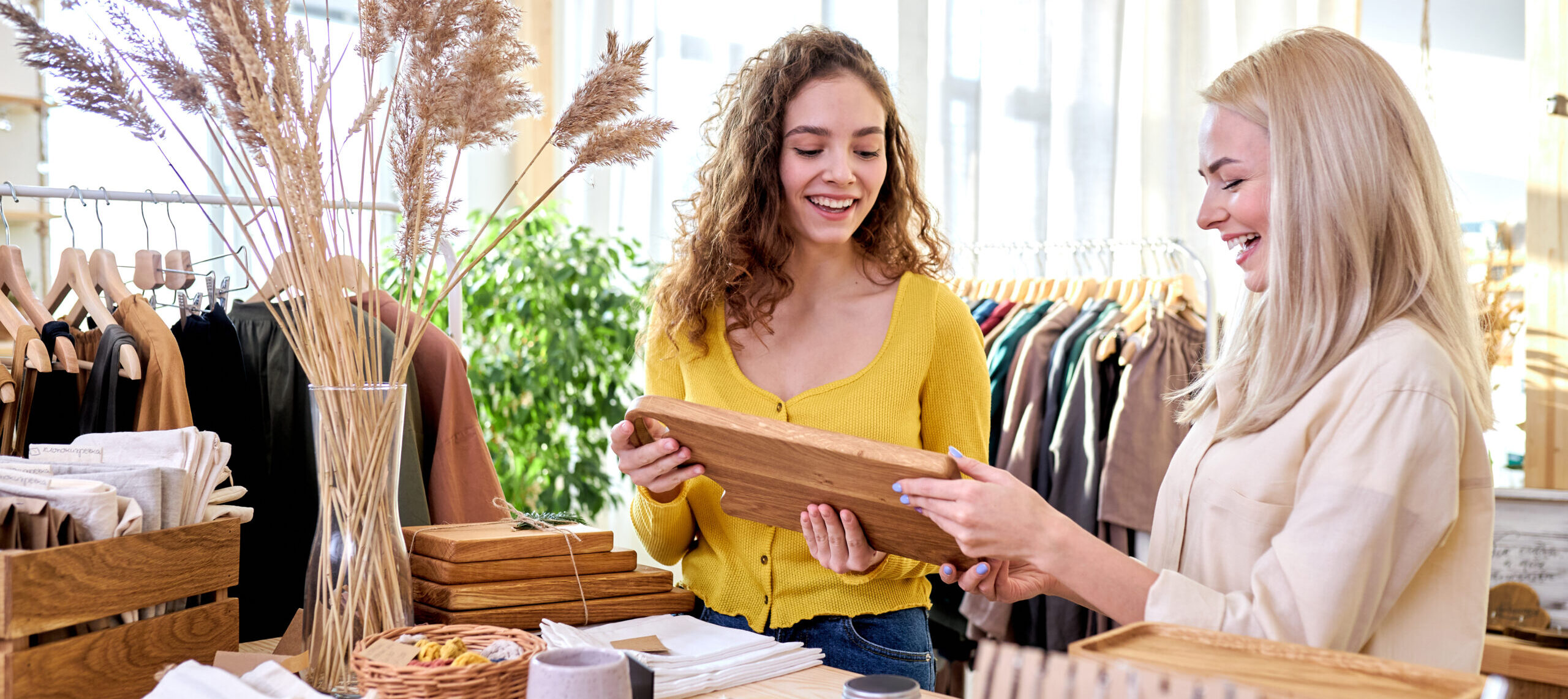 Businesswomen in their shop of decor and clothes