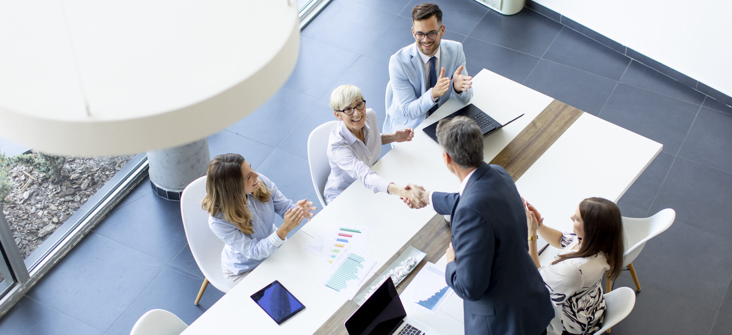 Aerial View of Professionals Working Around a Table